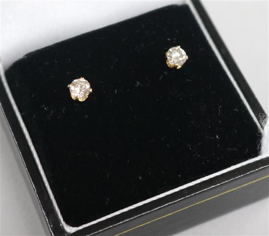 A pair of 14ct yellow gold mounted diamond ear studs